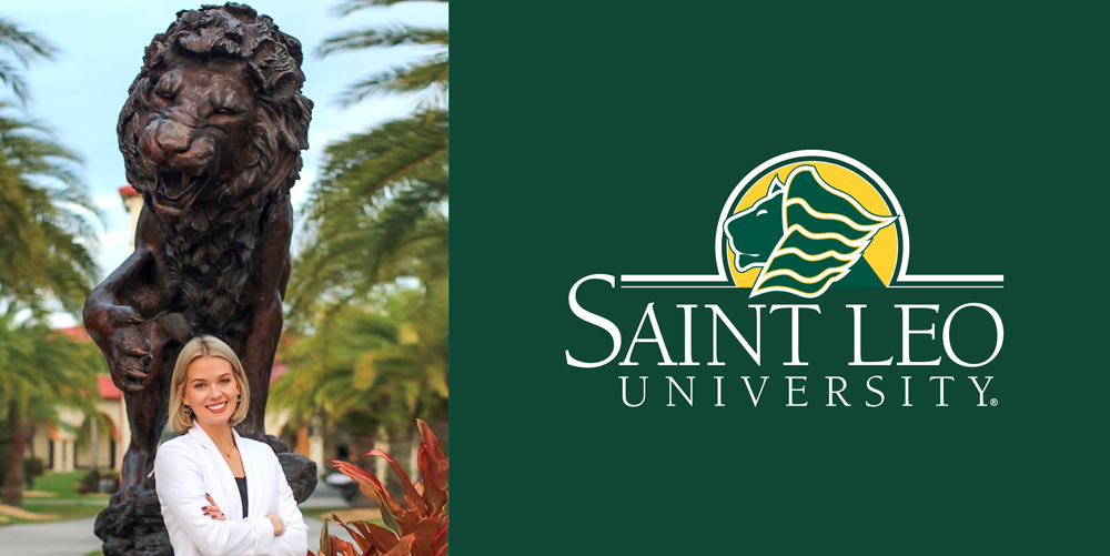 Emily-Prengaman-with-lion-statue-at-Saint-Leo-University-Campus